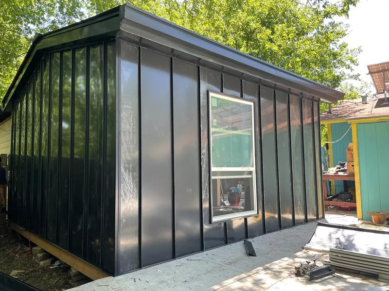 Black standing seam metal wall panels for Metal Roof Installation in Anoka