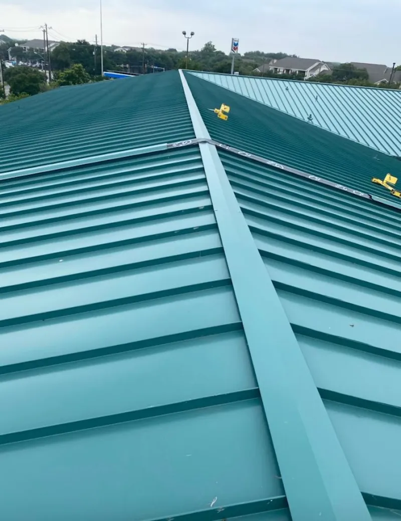 Green commercial metal roof ridge and valley for Metal Roof Repair in Anoka